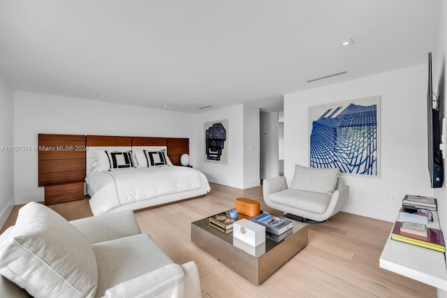 bedroom with light wood-type flooring