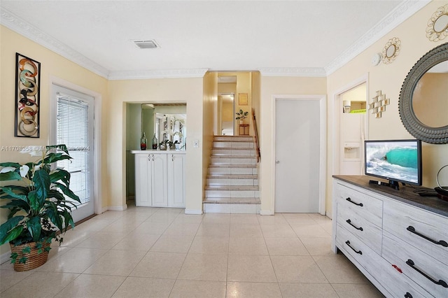 interior space featuring ornamental molding