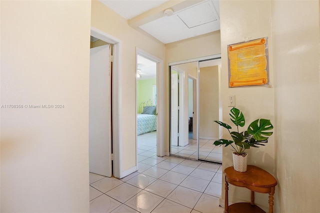 hallway with light tile patterned flooring