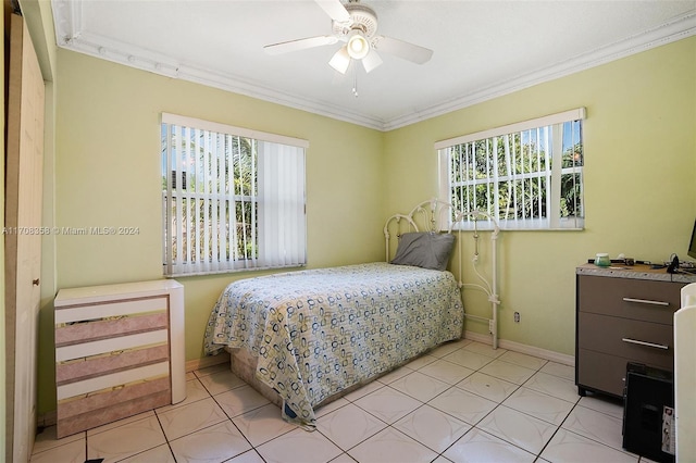 bedroom with ceiling fan, ornamental molding, and light tile patterned floors