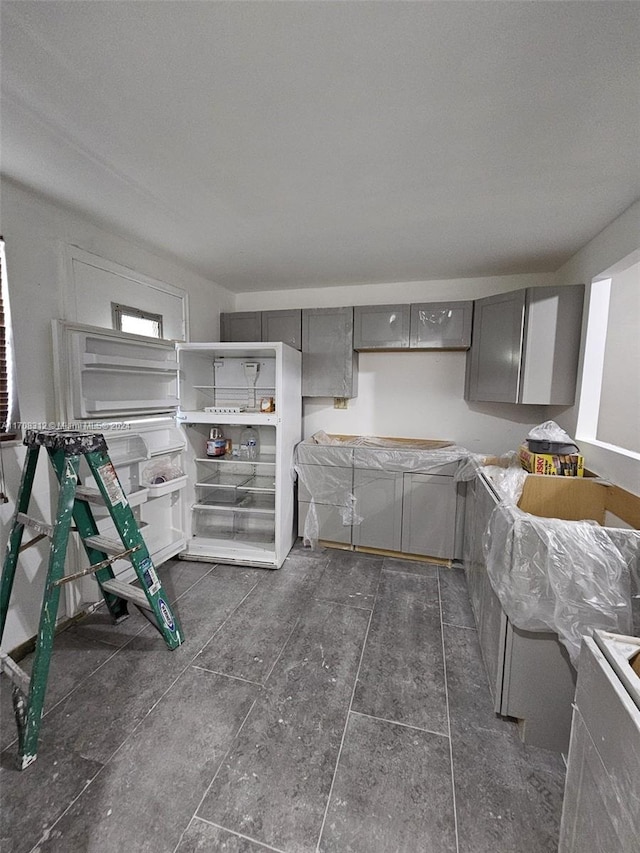 kitchen featuring gray cabinetry