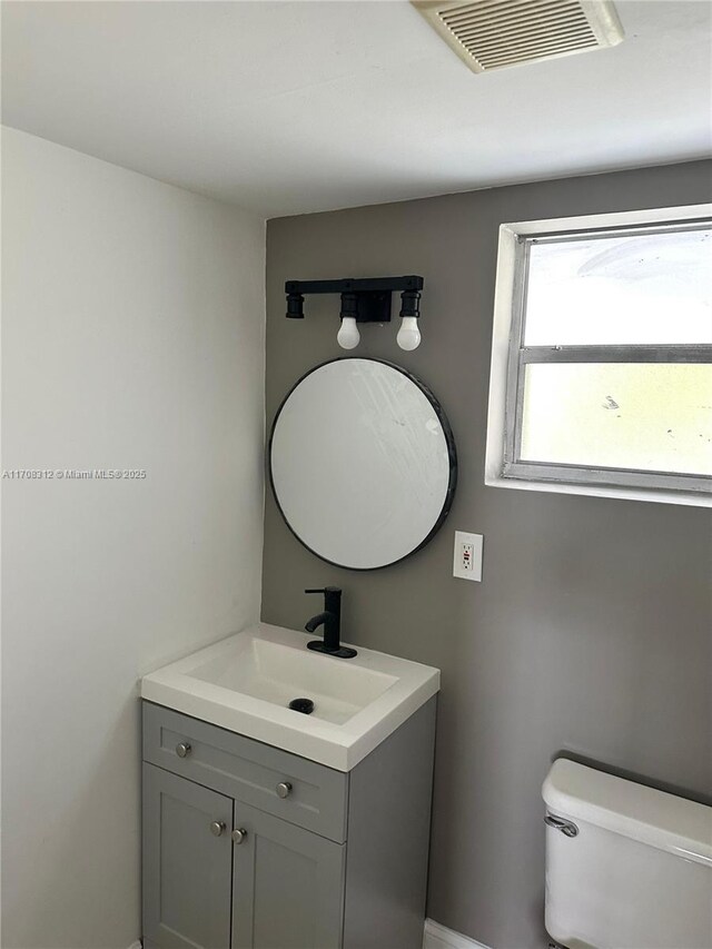 3600 NE 170th St Unit 402, North Miami Beach, FL 33160 - bathroom featuring vanity and toilet