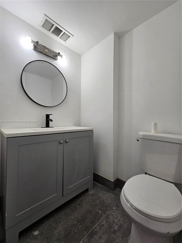 3600 NE 170th St Unit 402, North Miami Beach, FL 33160 - half bathroom featuring vanity and toilet