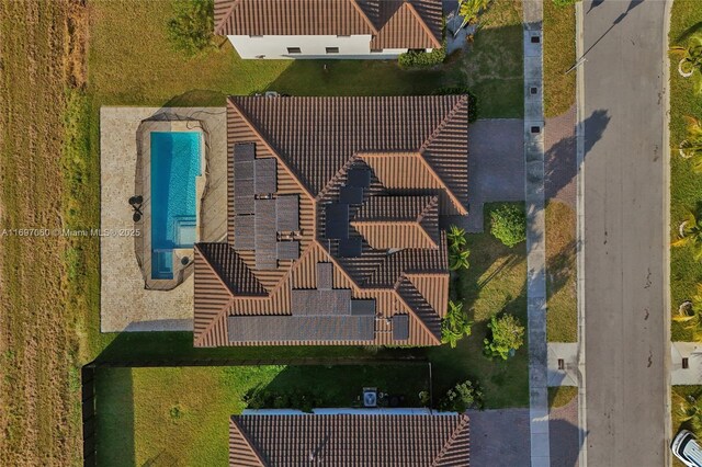 mediterranean / spanish-style house with a front yard