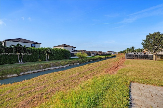 view of yard with a water view