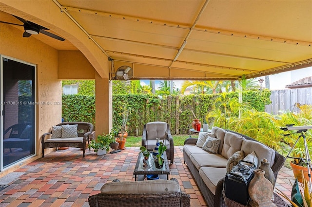 view of patio / terrace featuring an outdoor living space and ceiling fan