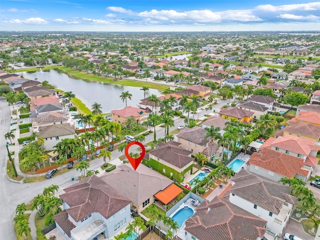 drone / aerial view with a water view