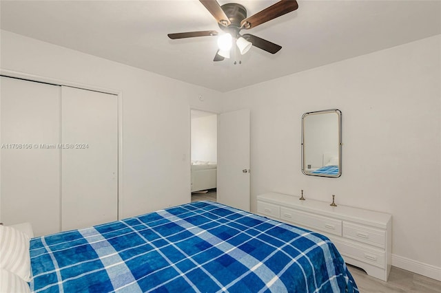 bedroom with a closet and ceiling fan