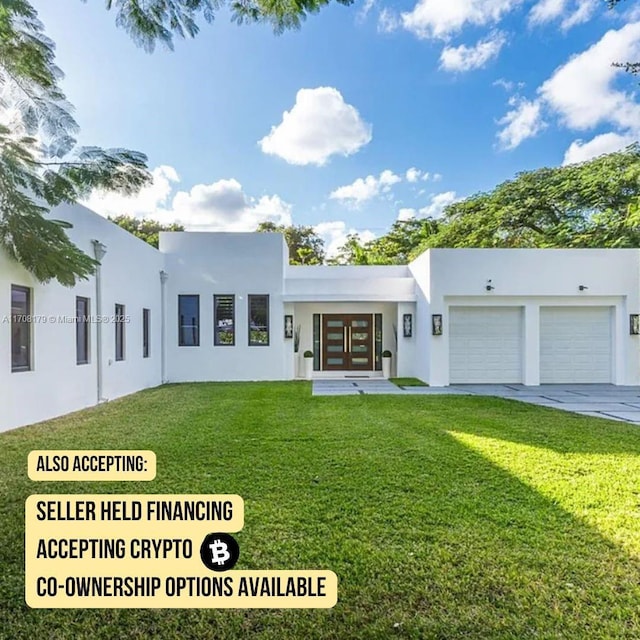 modern home featuring a garage and a front yard