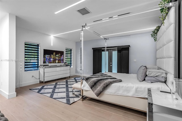 1120 Wallace St, Coral Gables, FL 33134 - bedroom featuring wood finished floors and baseboards