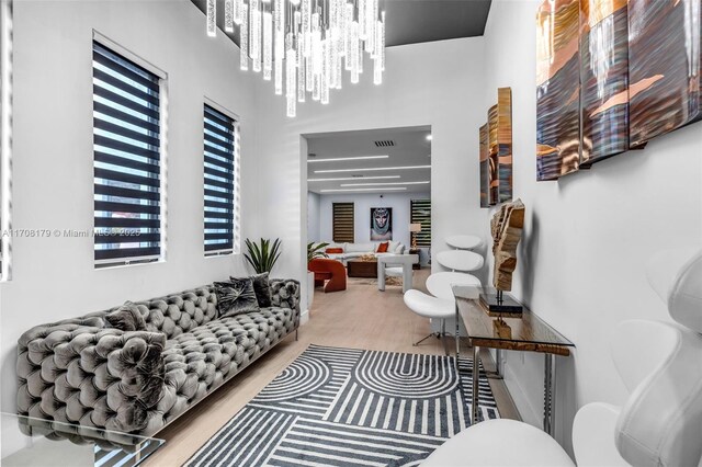 1120 Wallace St, Coral Gables, FL 33134 - living room featuring wood finished floors and a high ceiling