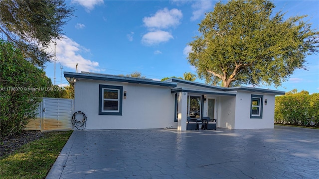 view of front of house with a patio