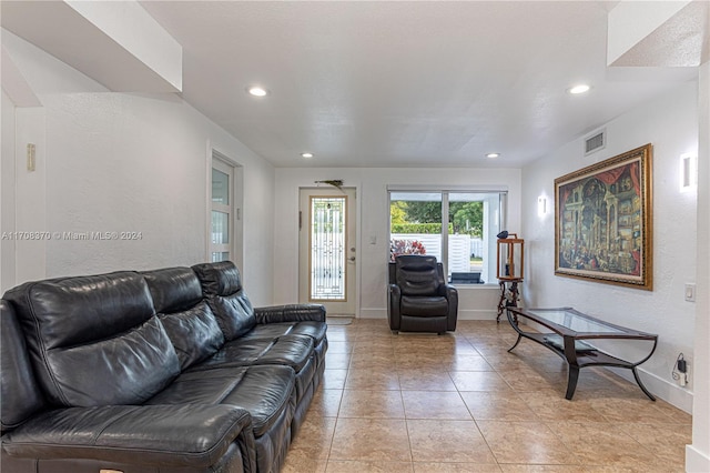 living room featuring light tile patterned floors