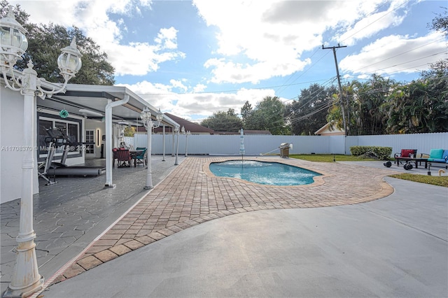 view of pool featuring a patio