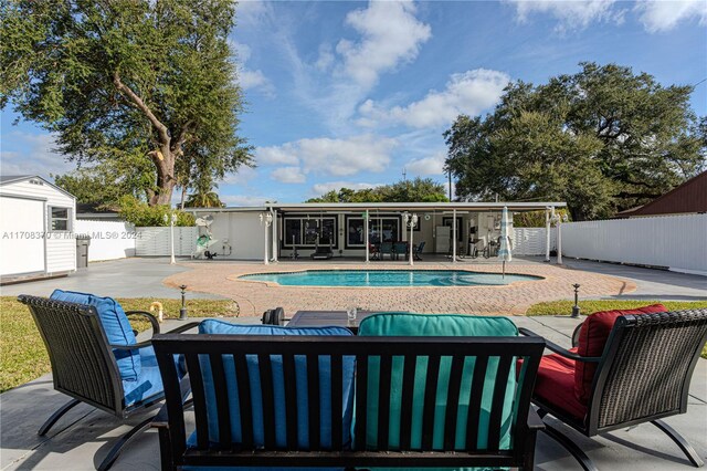 view of pool featuring a patio area and an outdoor hangout area