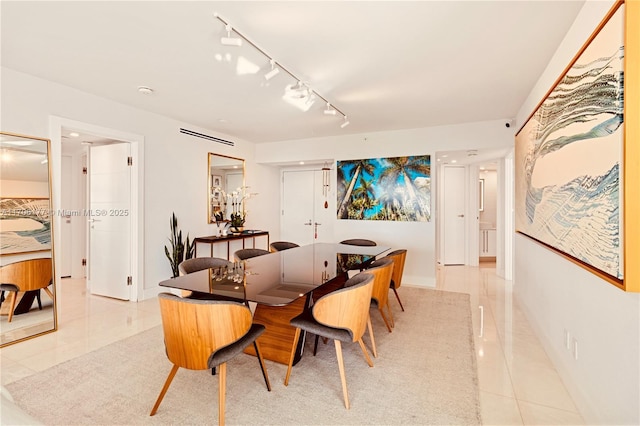 dining room featuring light tile patterned floors