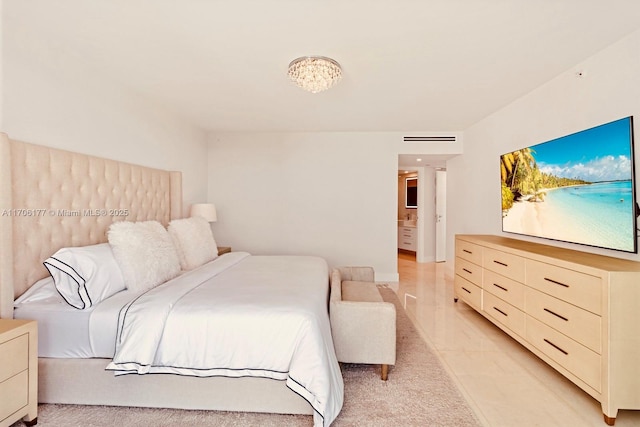 bedroom with light colored carpet