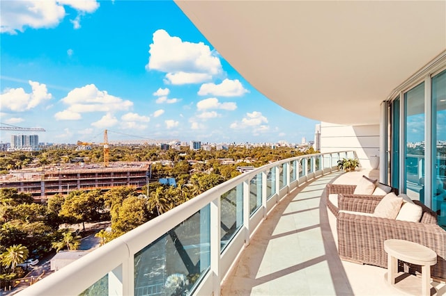 balcony featuring a view of city