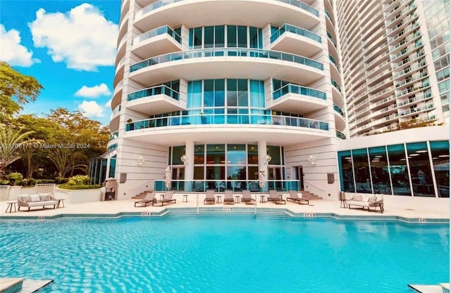 view of pool featuring a patio area