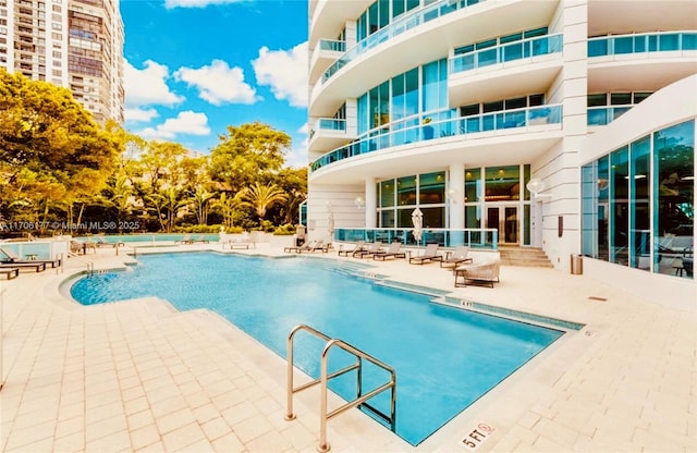 pool featuring a patio