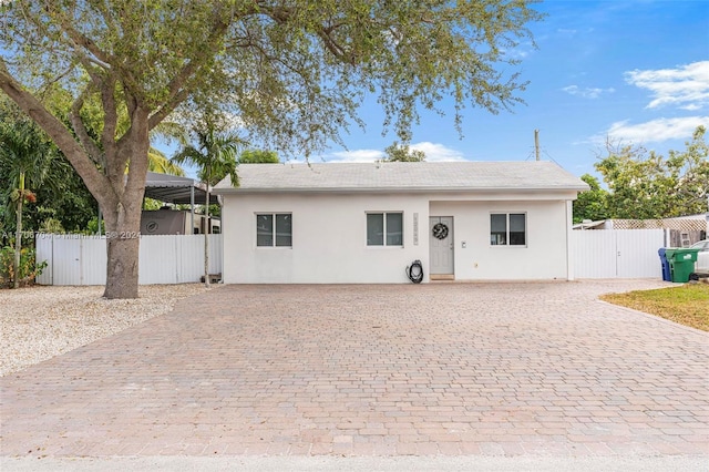 view of front of house featuring a carport