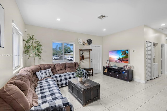 living room featuring light tile patterned flooring