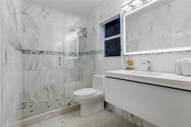 bathroom featuring walk in shower, vanity, toilet, and tile walls