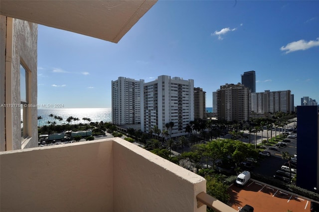 balcony featuring a water view