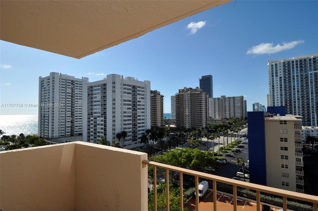 balcony featuring a water view