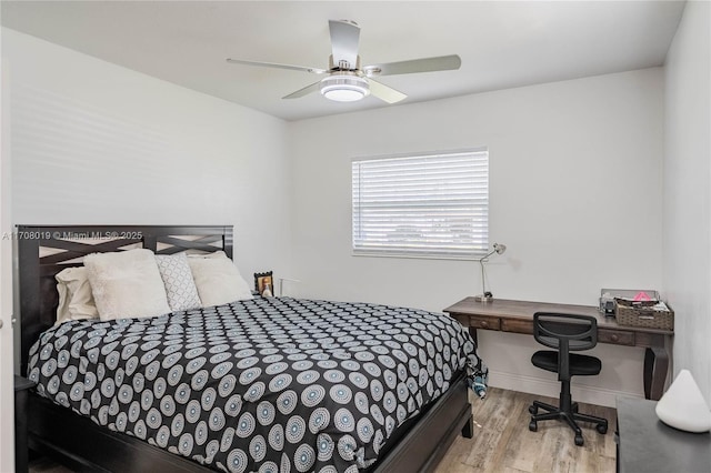 bedroom featuring ceiling fan and light hardwood / wood-style floors