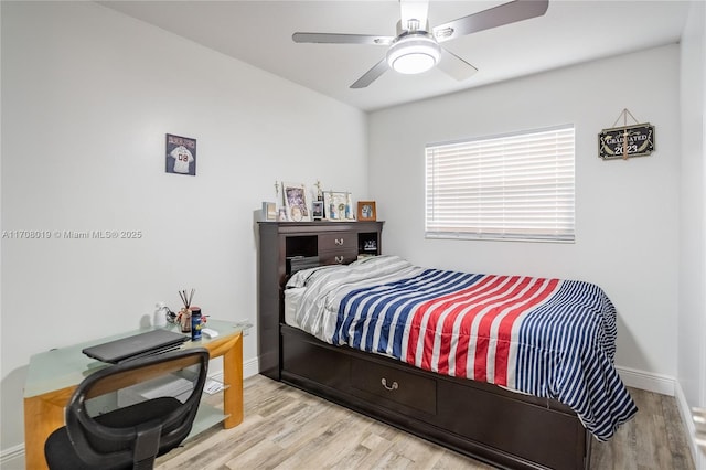 bedroom featuring ceiling fan and light wood-type flooring