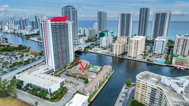 aerial view with a water view and a city view