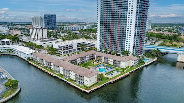 drone / aerial view with a view of city and a water view