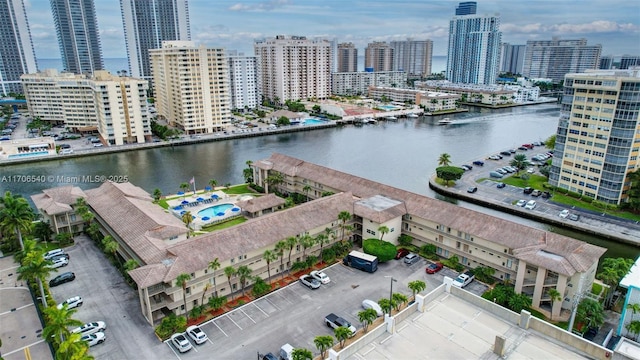 aerial view with a water view and a view of city