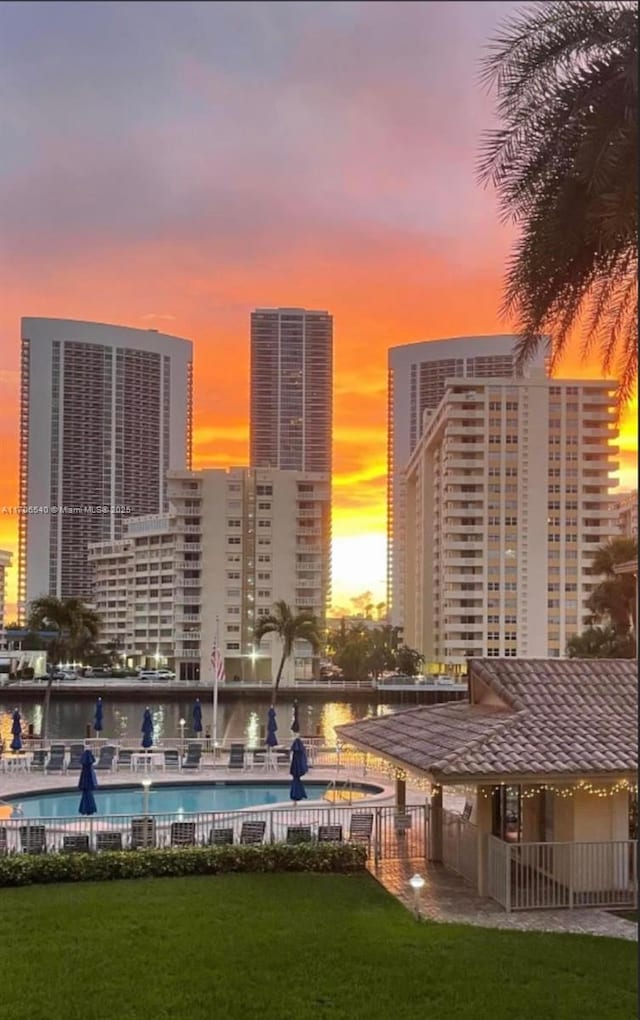 property's view of city featuring a water view