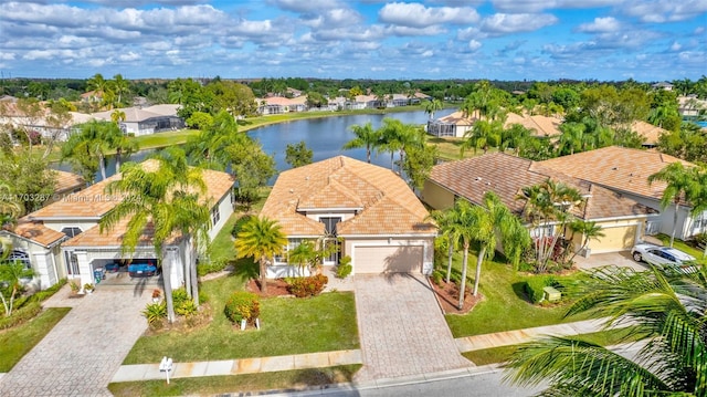 drone / aerial view with a water view