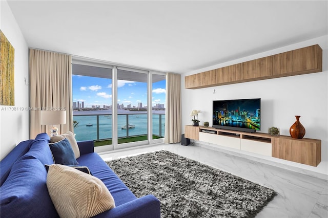 living room with expansive windows and marble finish floor