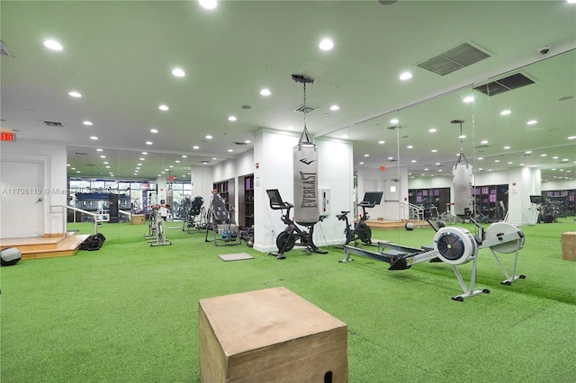 exercise room featuring visible vents and recessed lighting