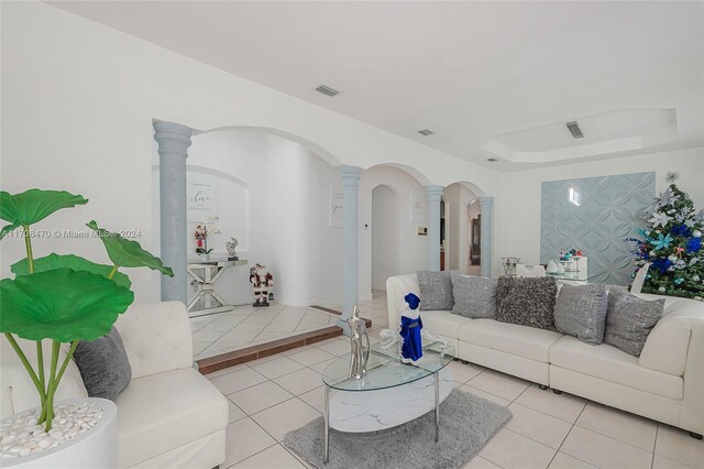 15226 SW 21st Ln, Miami, FL 33185 - living room with ornate columns, light tile patterned flooring, and arched walkways