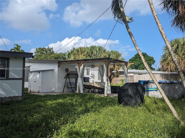 view of outdoor structure with fence