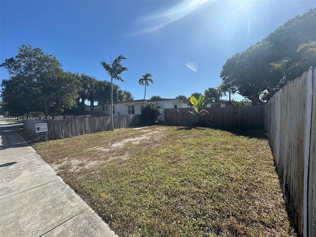 view of yard featuring a fenced backyard