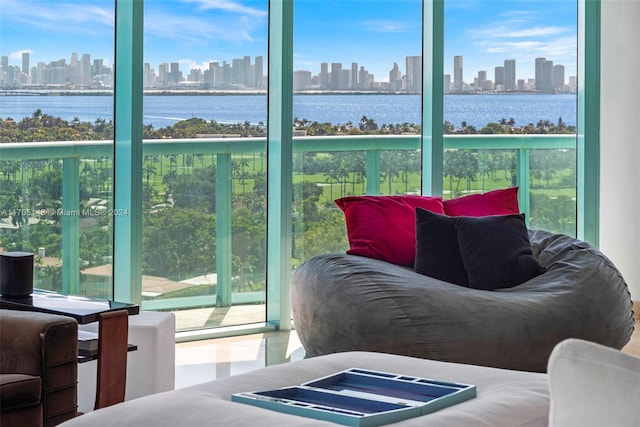 sunroom / solarium with a water view