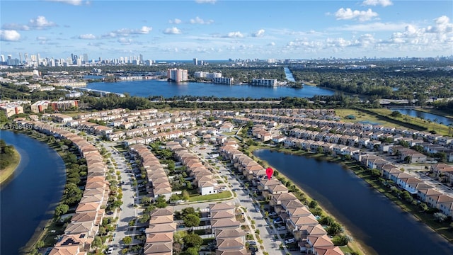 drone / aerial view with a water view and a city view