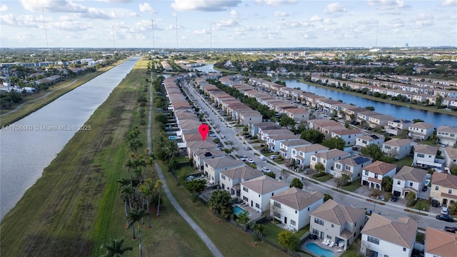 aerial view featuring a water view and a residential view