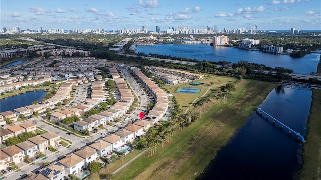 aerial view featuring a water view and a city view