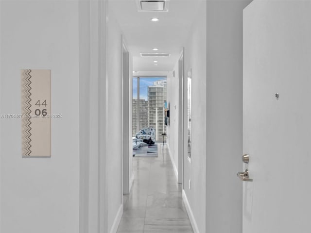 hallway with a wall of windows