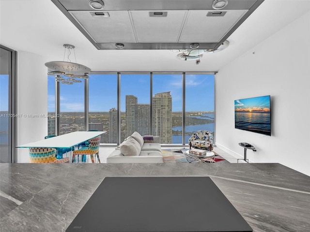 unfurnished living room featuring floor to ceiling windows