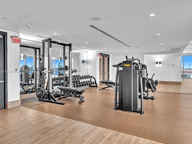 gym featuring light wood-type flooring