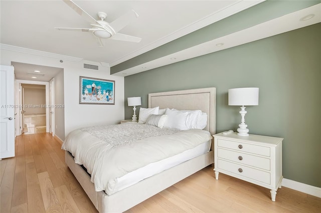 bedroom with ceiling fan, ornamental molding, and light hardwood / wood-style flooring