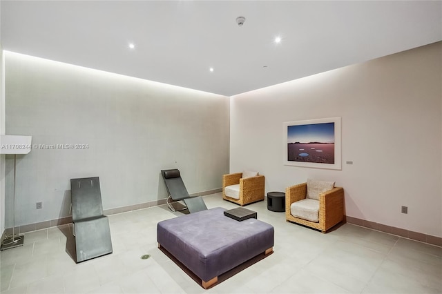 living area featuring light tile patterned floors